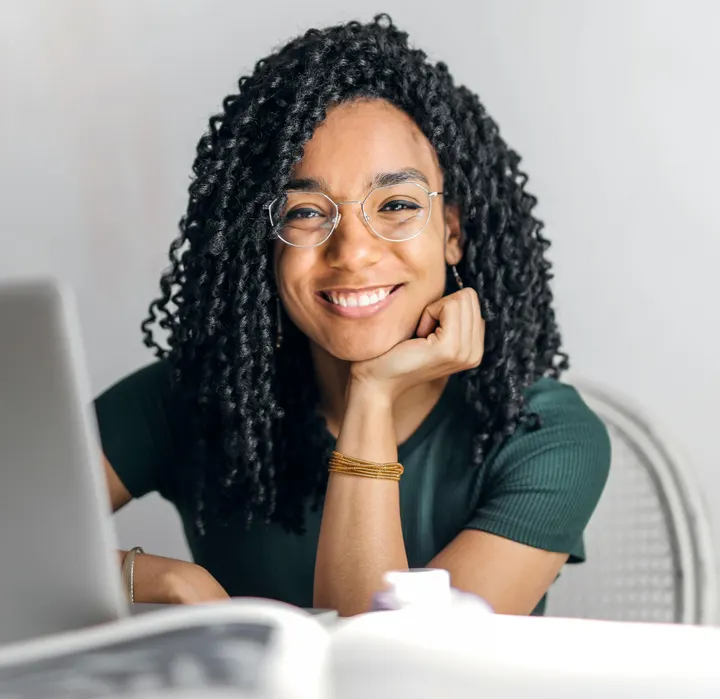 A professional working on her computer